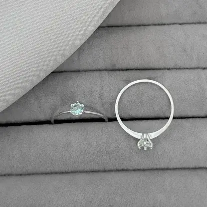 ANEL SOLITARIO 6 GARRAS AZUL CLARO 4MM